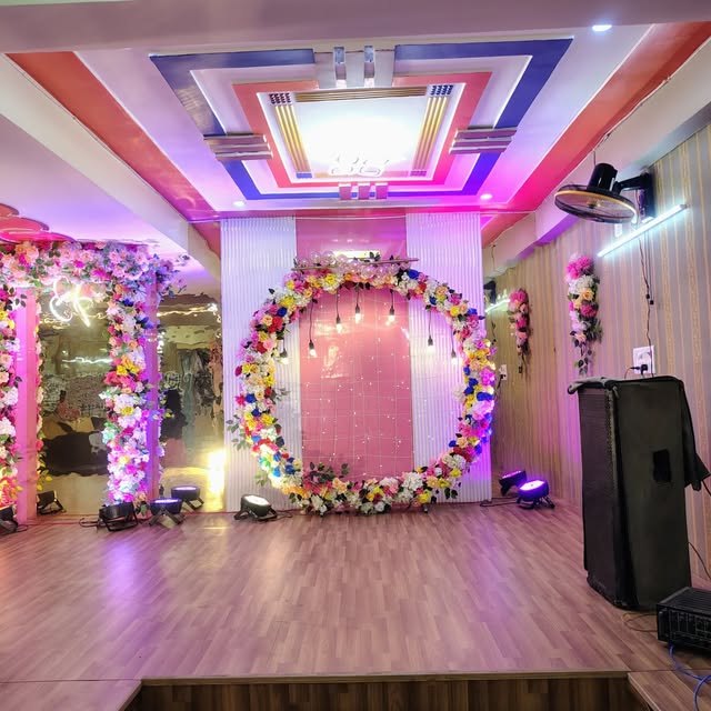Floral stage backdrop and ceiling decoration inside Shiv Mansa Dhika Banquet